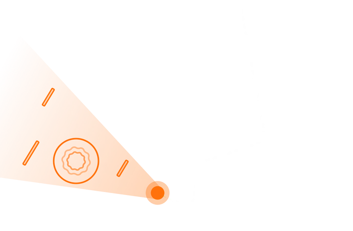 An orange dot casts an orange glow on objects in front of it.