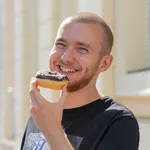 Eric eating a donut